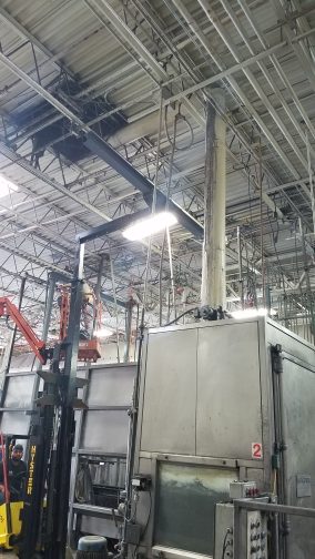 Crane inside a big industrial room